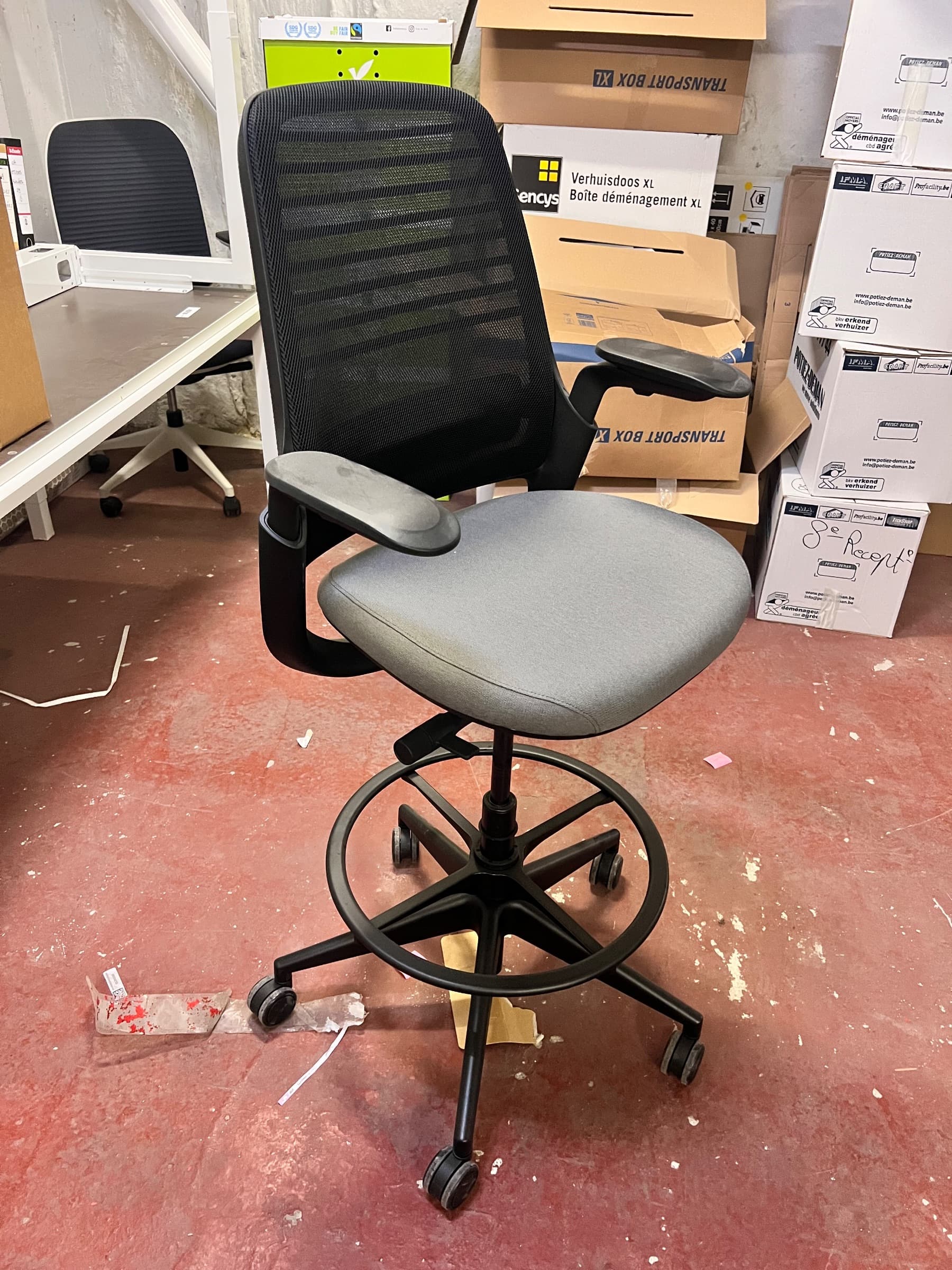 Black mesh and gray fabric office chair with adjustable height and armrests-0