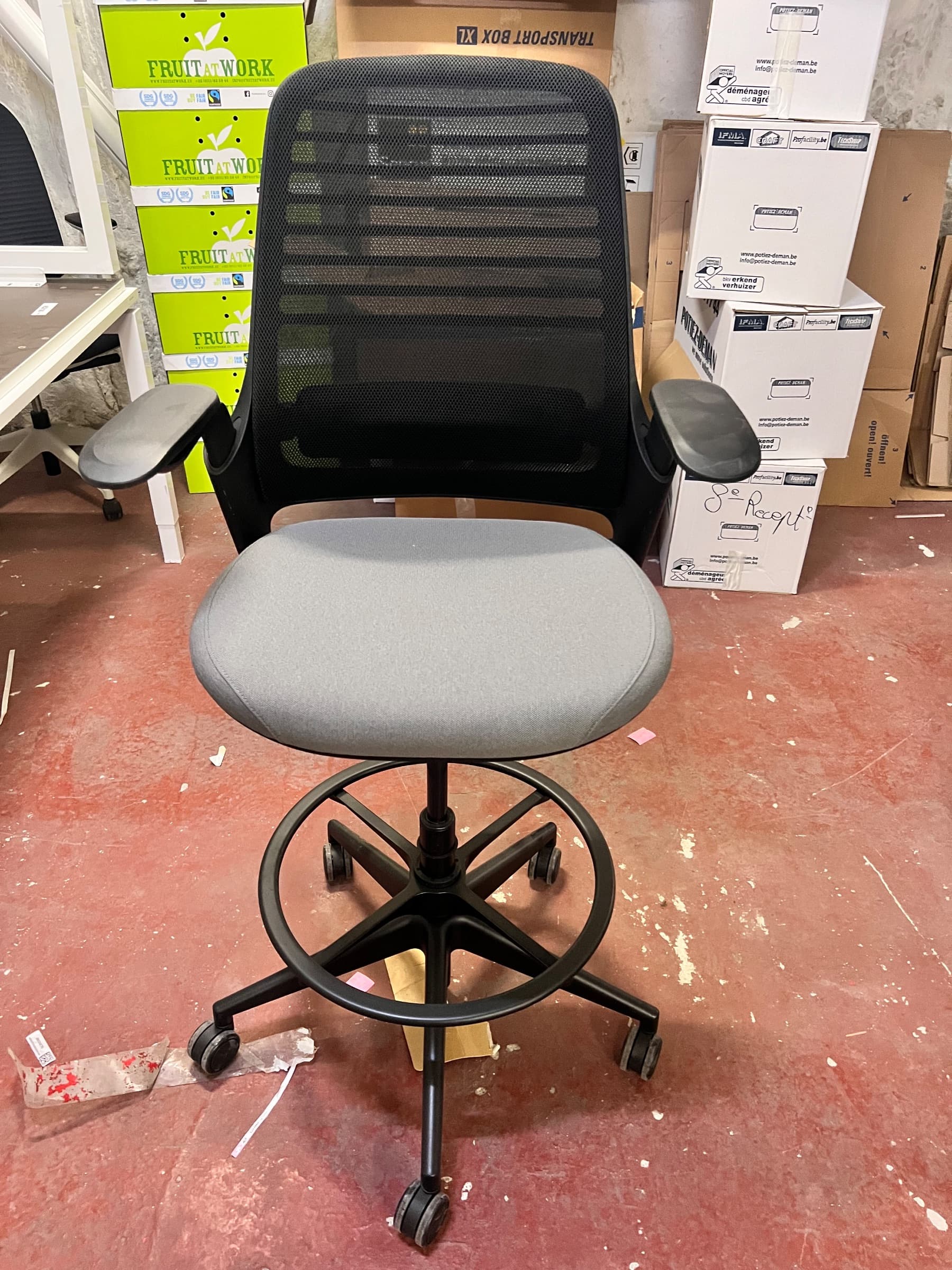 Black mesh and gray fabric office chair with adjustable height and armrests-3