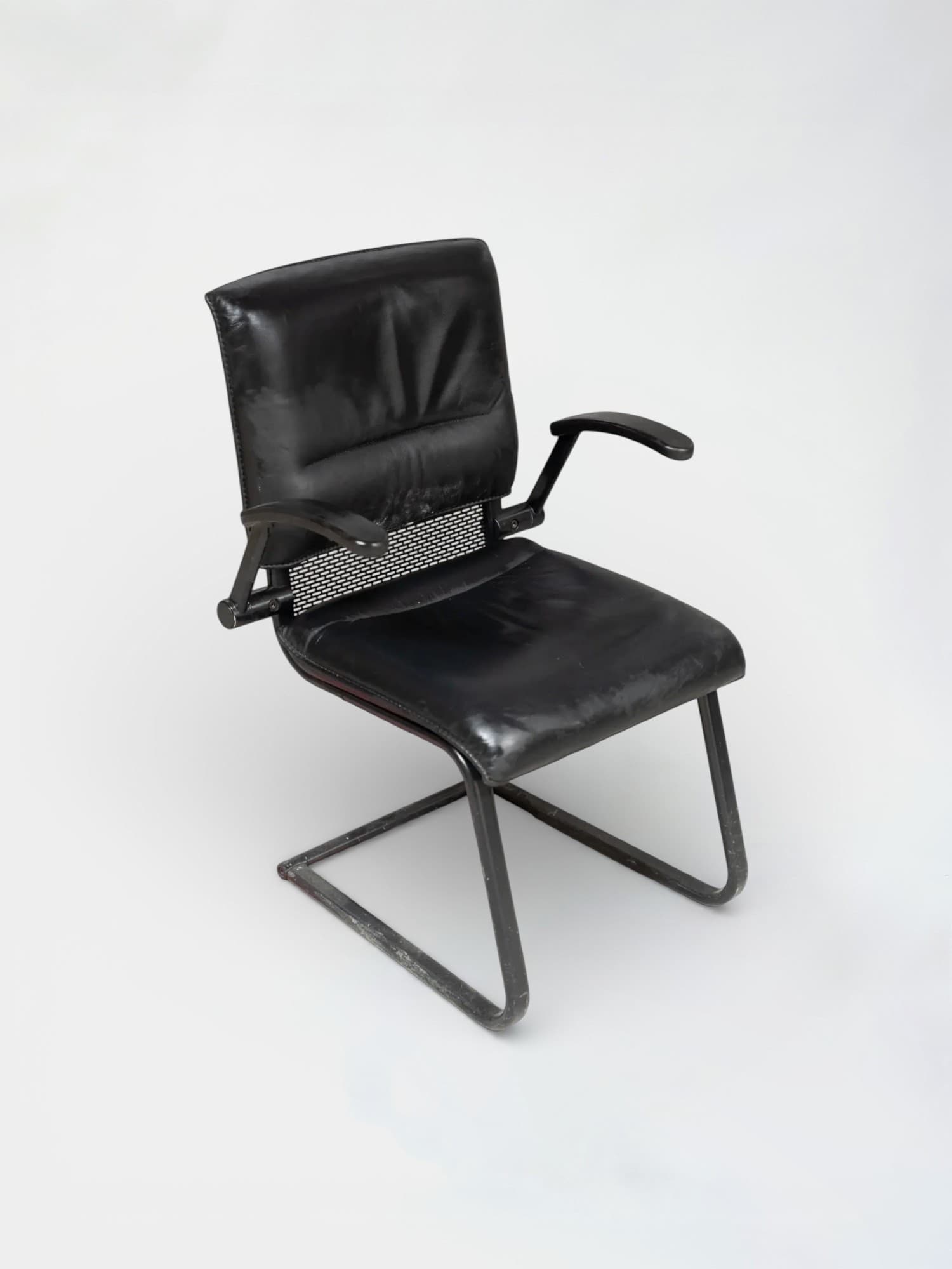 Black leather chair on black legs-0