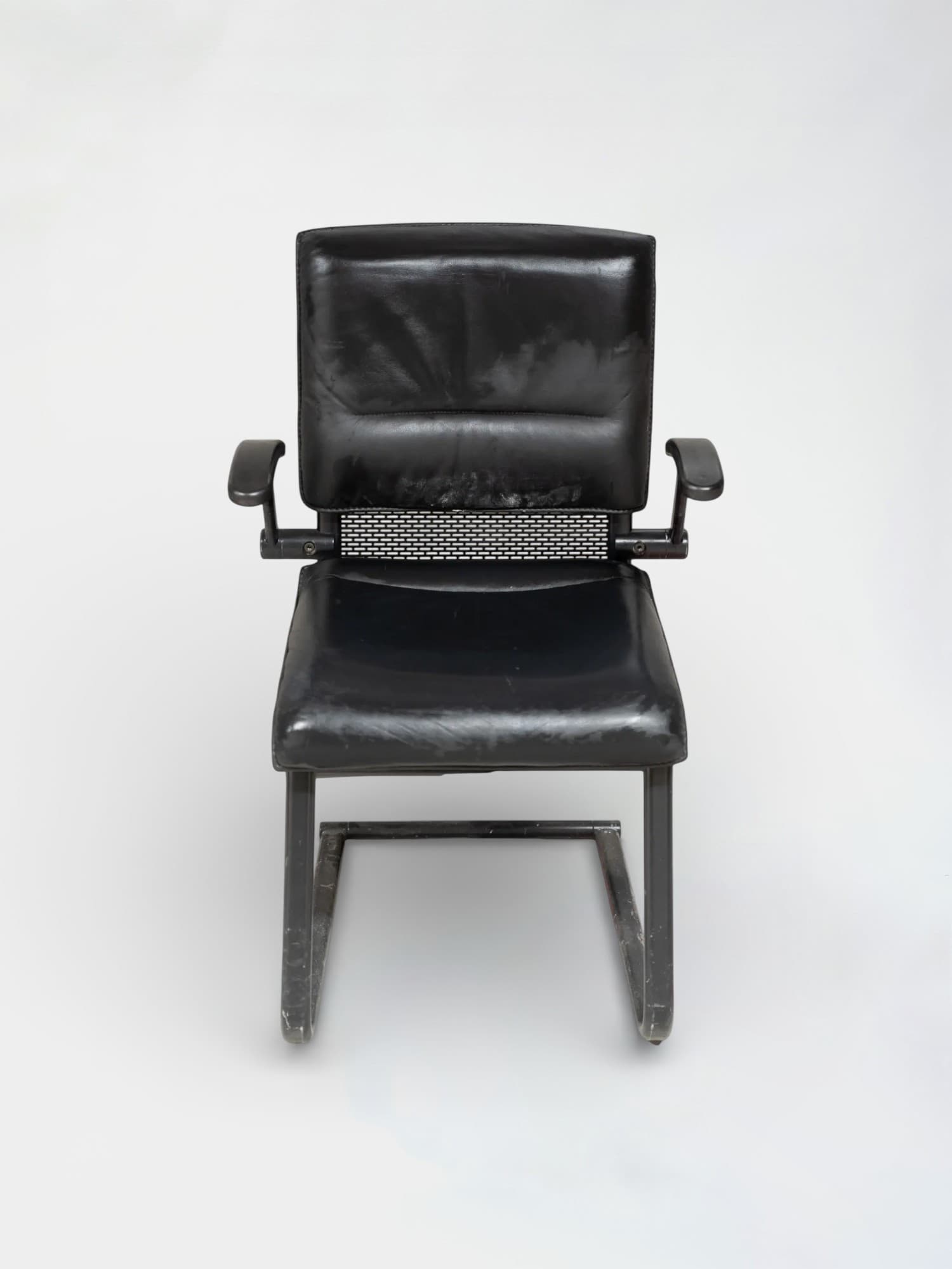 Black leather chair on black legs-1