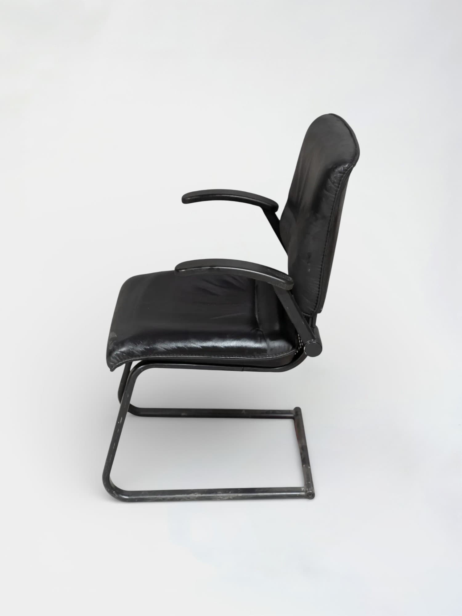 Black leather chair on black legs-3