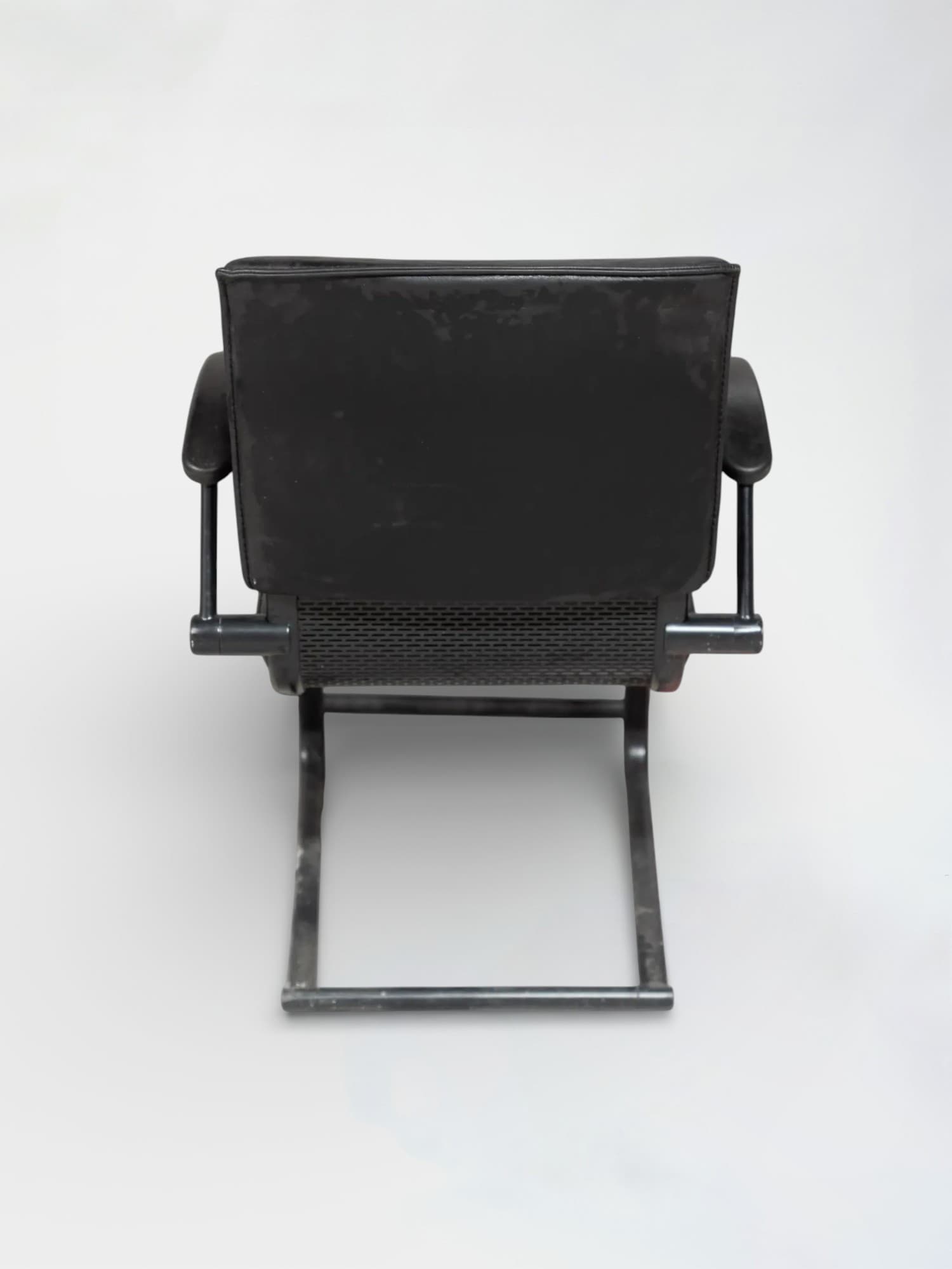 Black leather chair on black legs-2