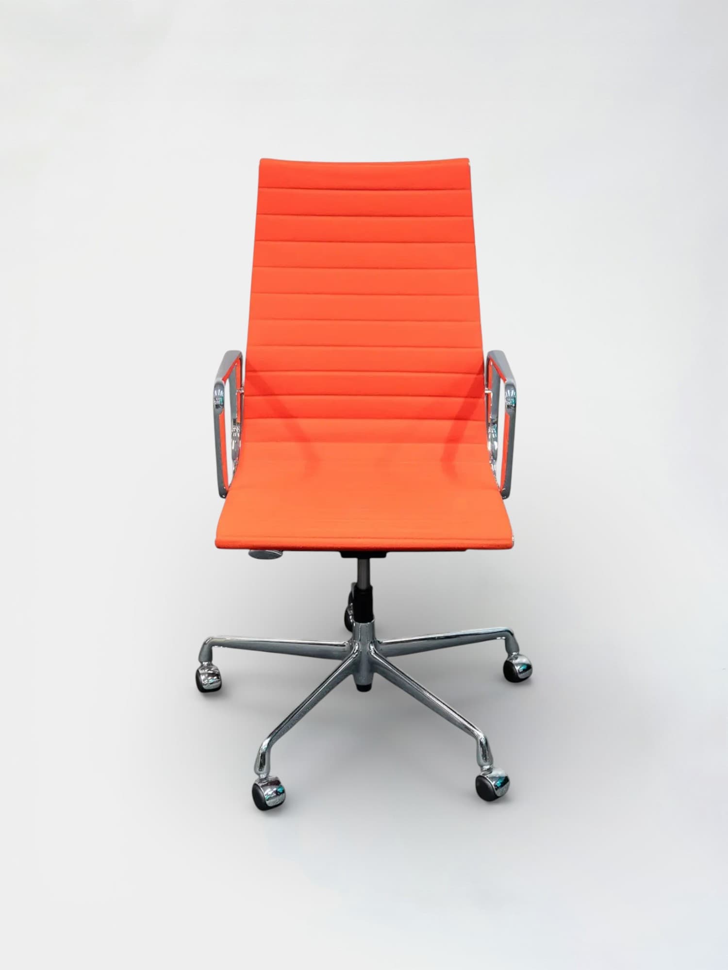 Vitra EA 119 orange chair on castors