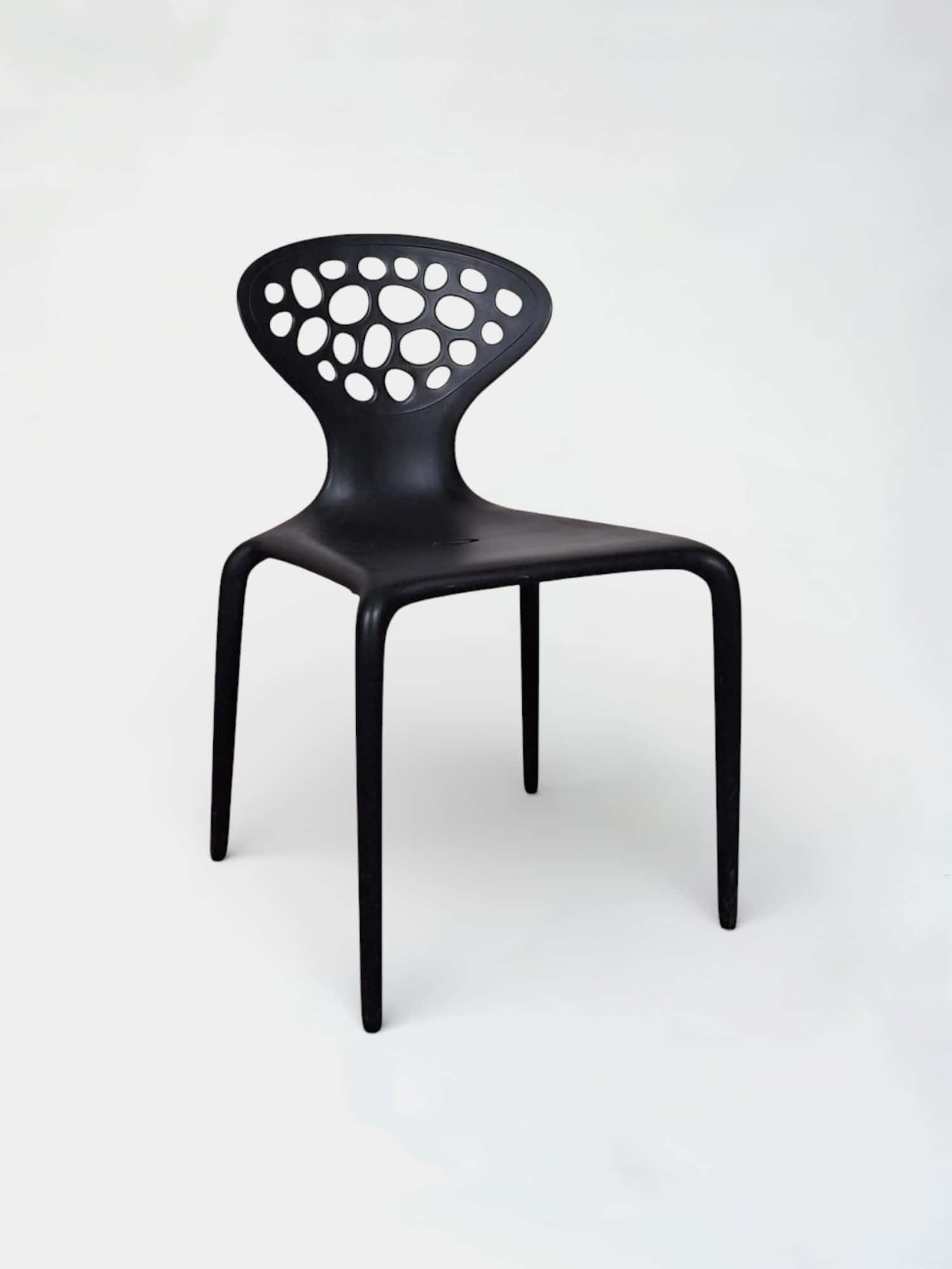 Moroso Supernatural black stackable design chairs by Ross Lovegrove product image