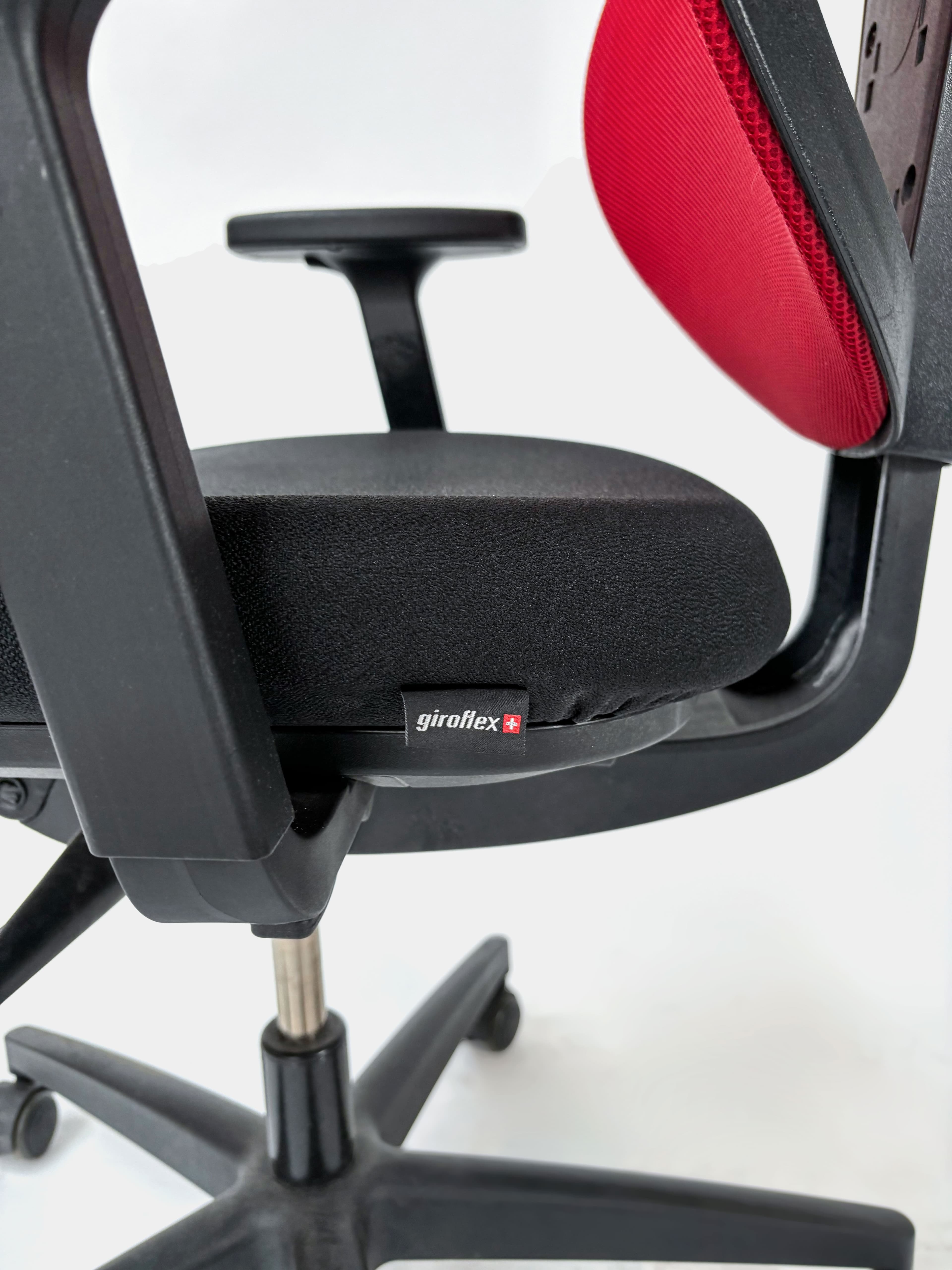 GIROFLEX Ergonomic adjustable red and black office chair on wheels-3