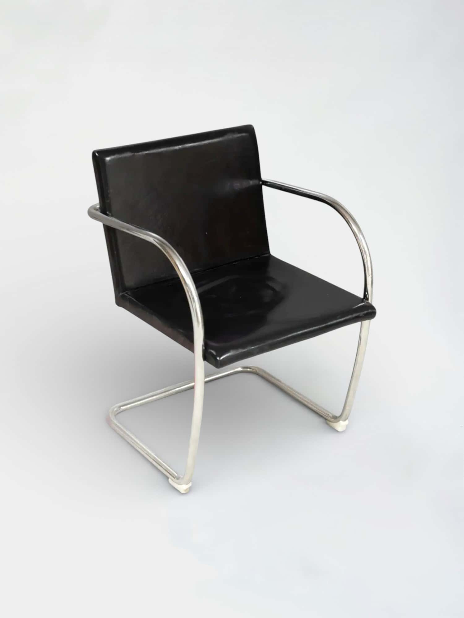 Knoll Brno replica Black leather chair with steel armrest and legs product image