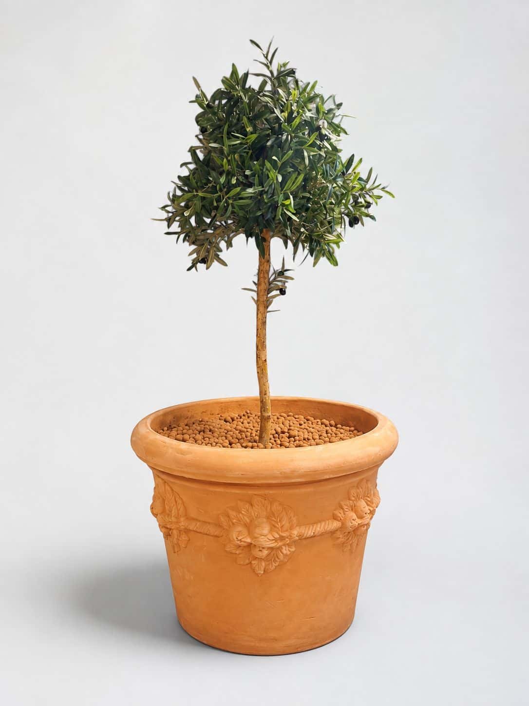 Fake plant in a large pot. product image